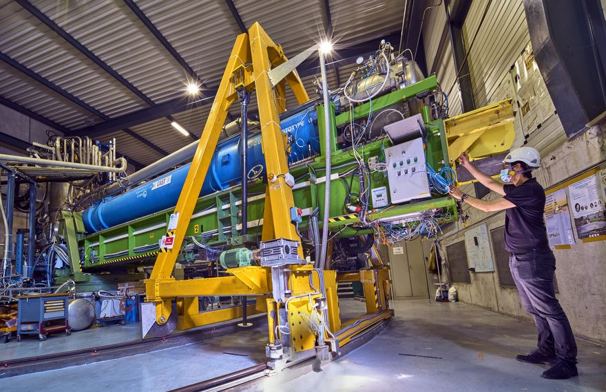 A scientist checks the RADES detectors in the former CAST experiment at CERN (Photo: Maximilien Brice/CERN)