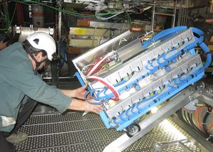 Installation of a muon chamber in the ATLAS detector