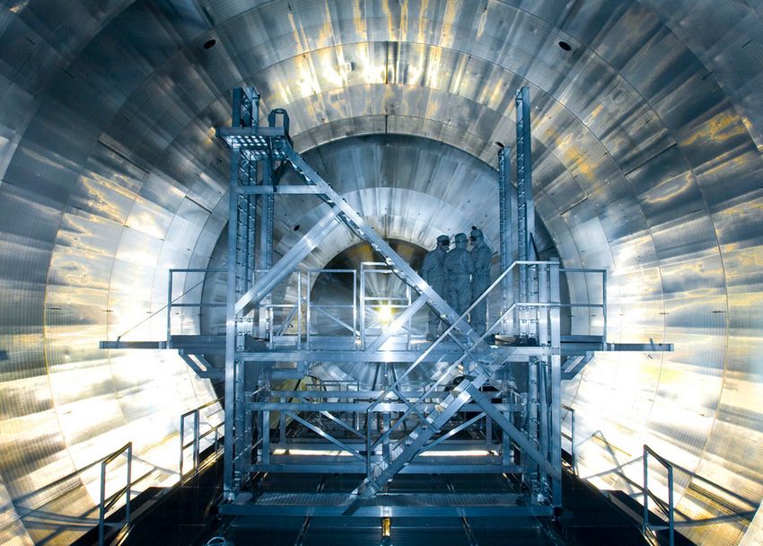 The KATRIN experiment: view of the large spectrometer. Here, scientists measure the energy of electrons emitted in Tritium decay. The energy is supposed to disclose the mass of the neutrino.