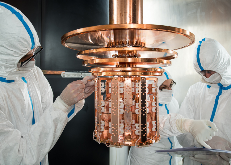 Mounting the CRESST experiment with scientists installing the new detector modules.  